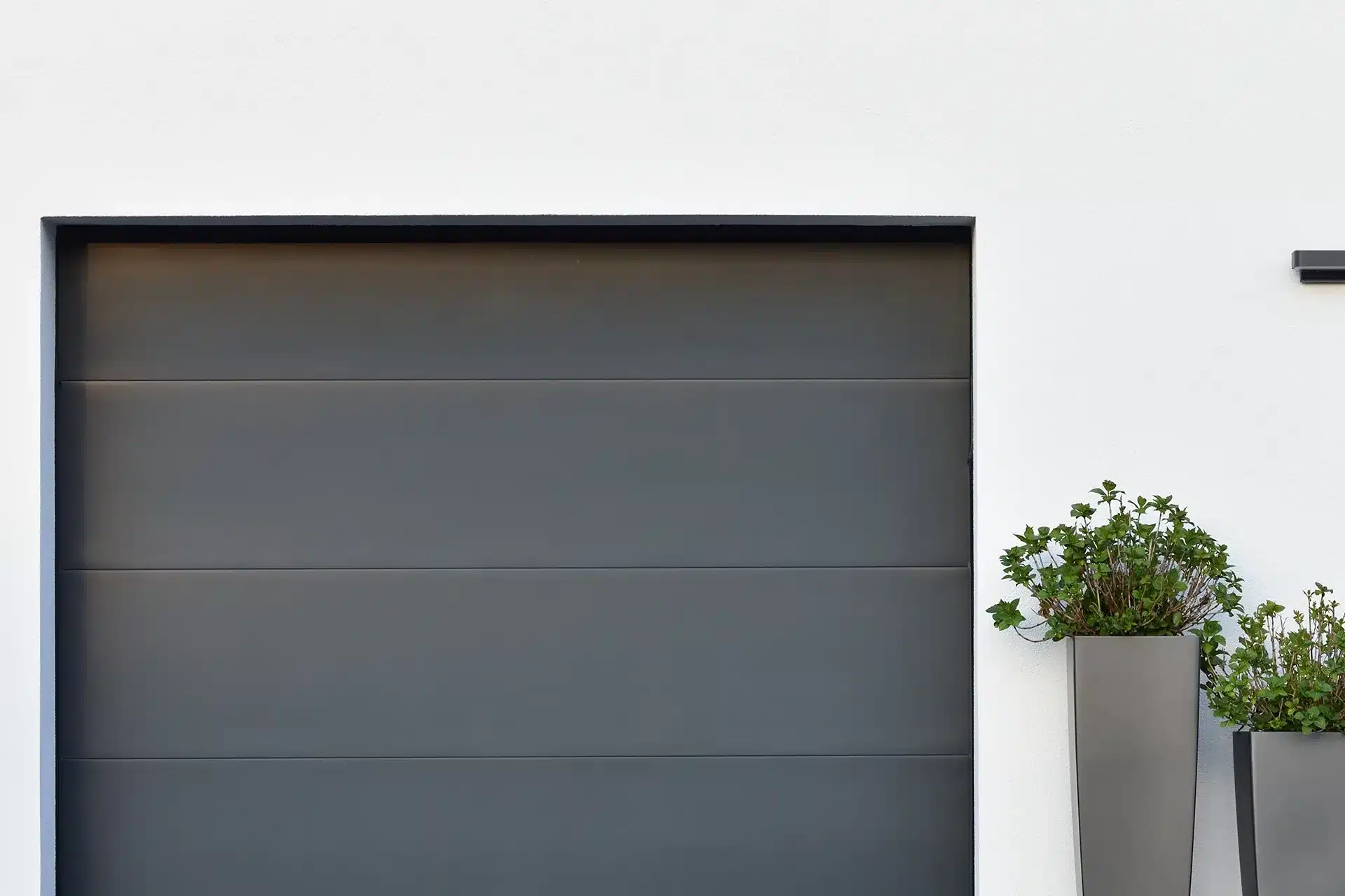 pose-porte-garage-sectionnelle-techniportes-clemery Pour les particuliers  